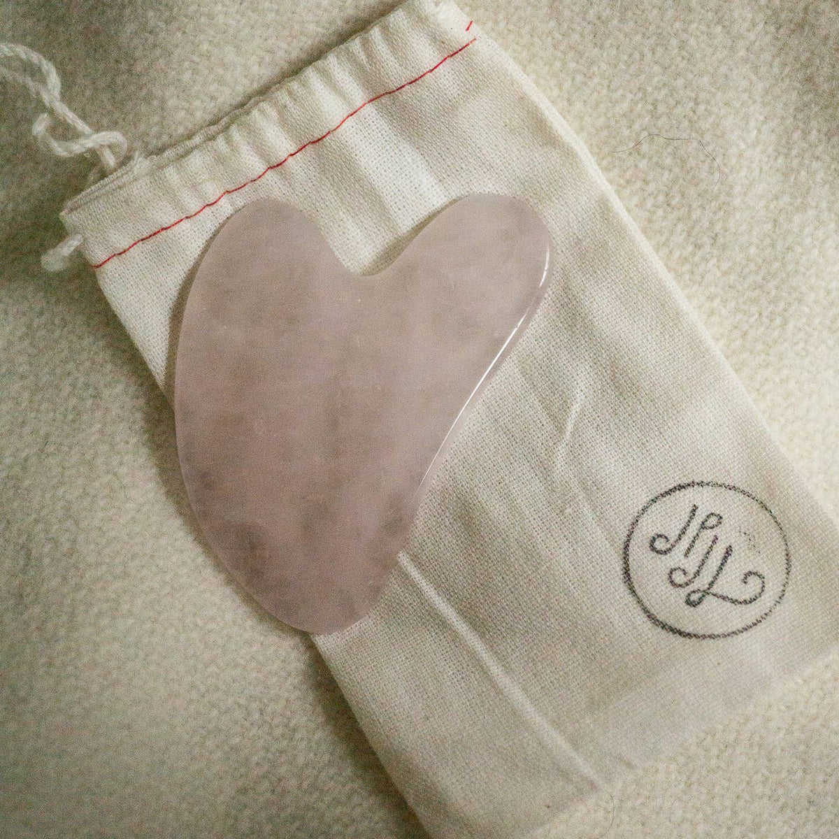 rose quartz gua sha stone