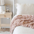 montana coles ruched throw in blush
