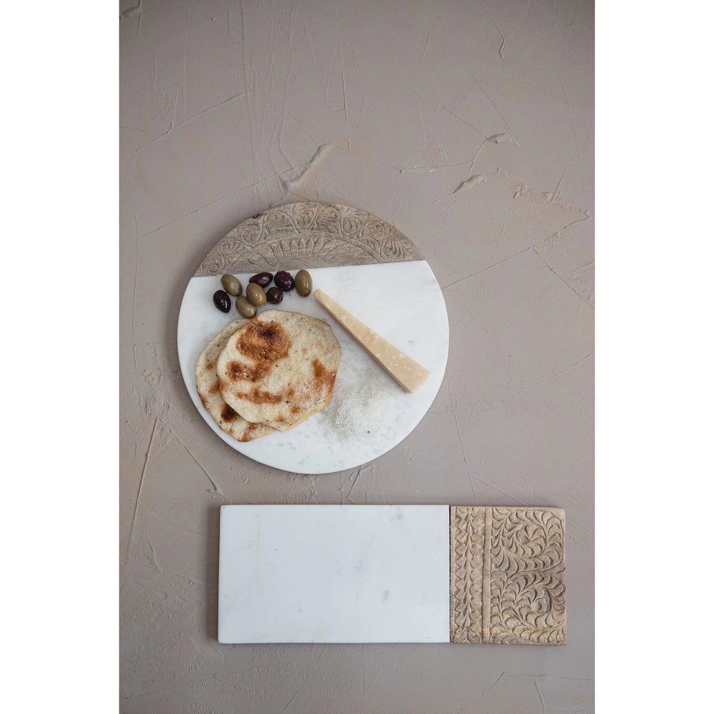 round hand-carved serving board