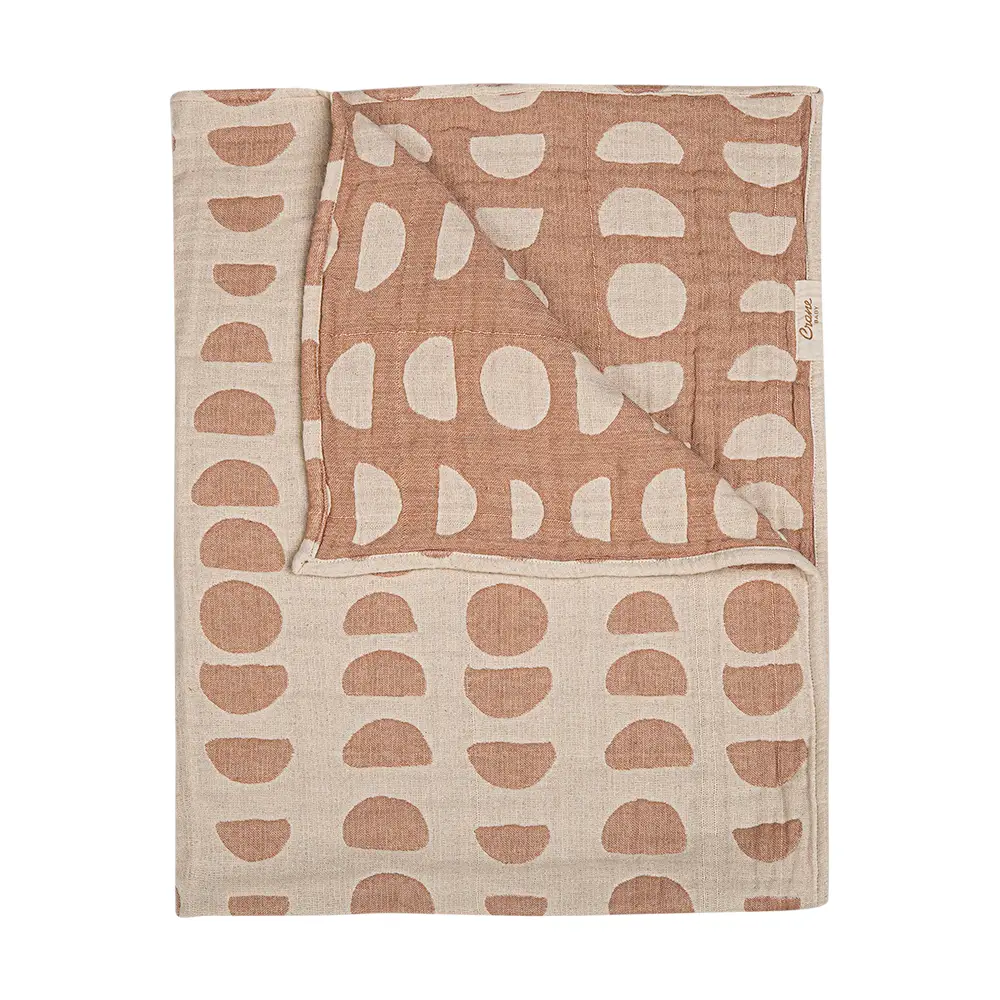 jacquard blanket in copper moons