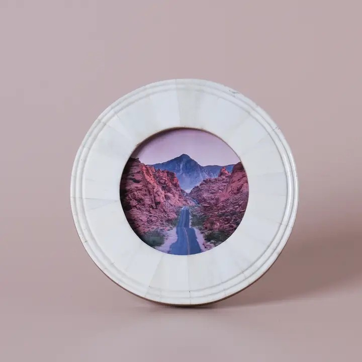 round photo frame in bone